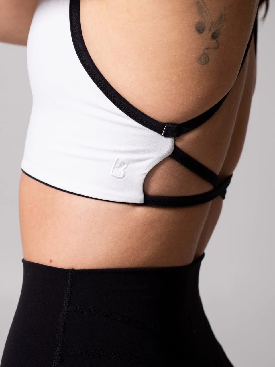 Girlfriend Reversible Sports Bra - Onyx Black and White - Image 6